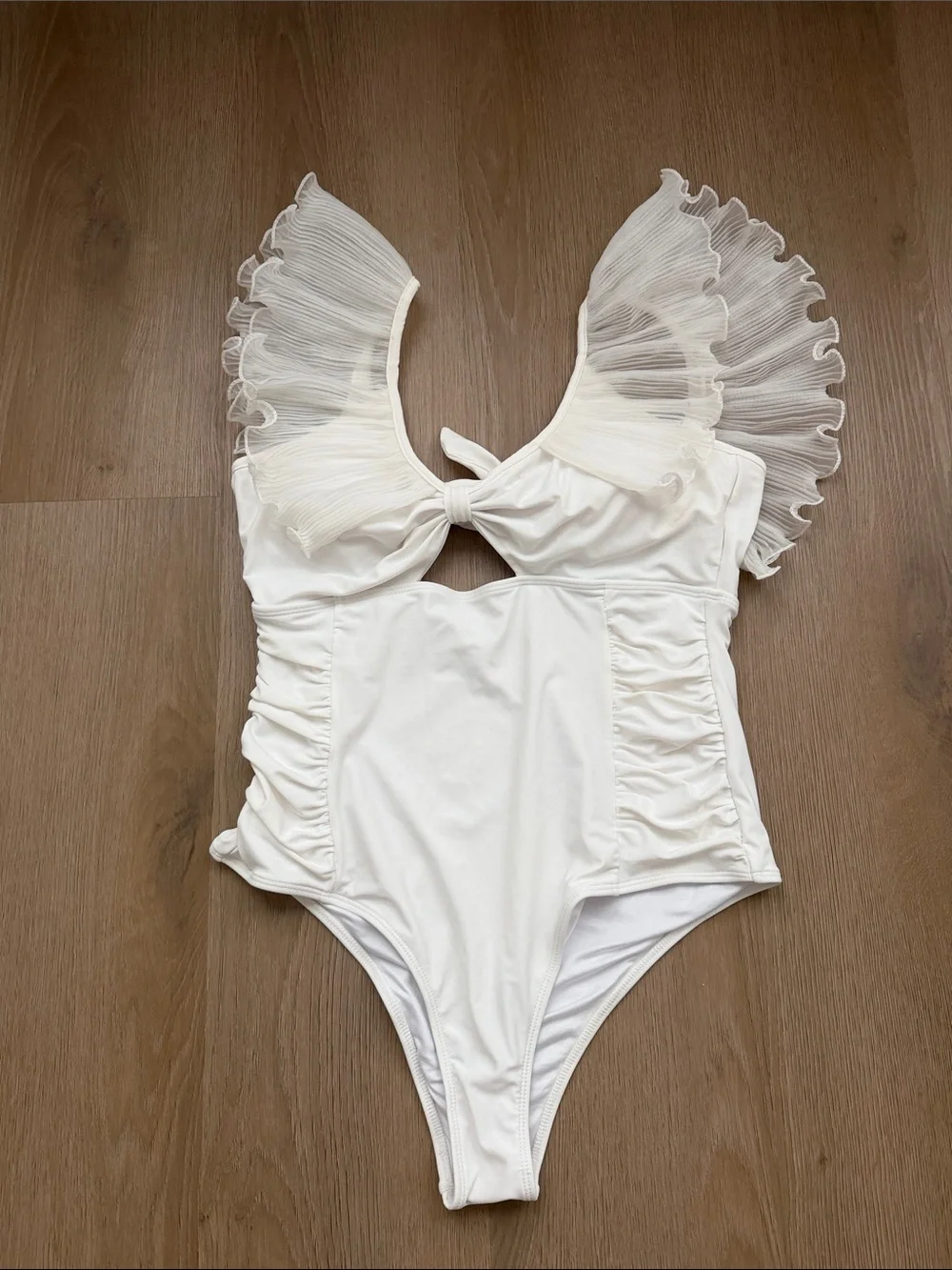 White Ruffle V-Front One-Piece swimsuit